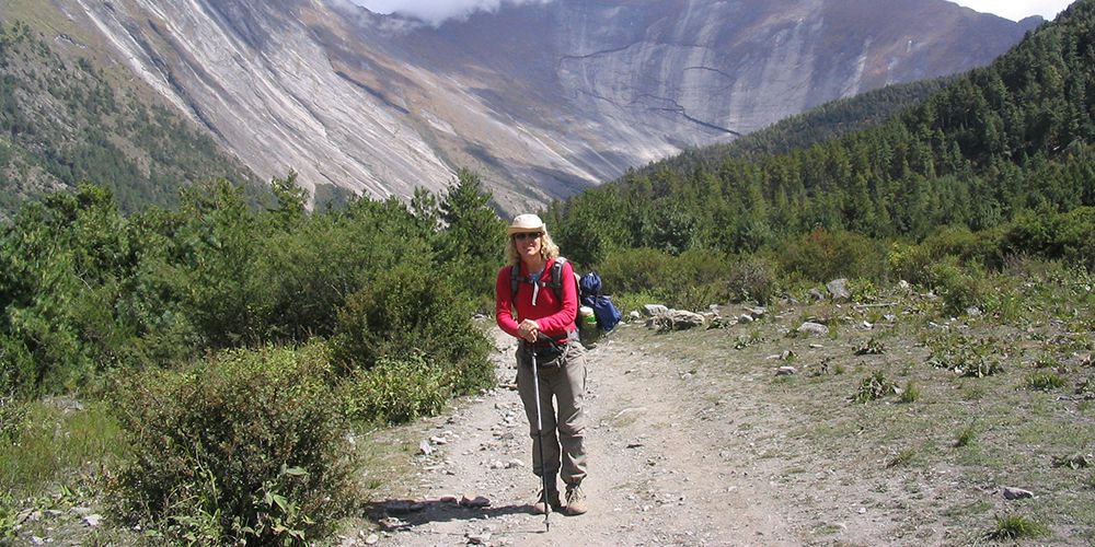 Adventure Girl with Stone Wall in Manang Valley!